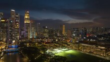 Sunset Night Illumination Singapore City Tourist Famous Boat Quay Downtown Aerial Panorama 4k Timelapse