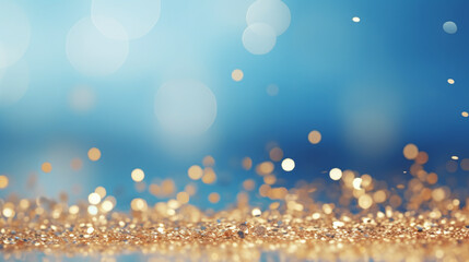 Golden glittering confetti against blue colored background