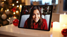 A Tablet Displaying A Smiling Person With Christmas Lights And Decorations In The Background, Symbolizing Holiday Cheer And Digital Connectivity.