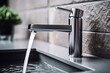 Chrome bathroom faucet and fitting close up, for home improvement and plumbing concepts