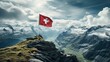 Majestic swiss mountain range with the iconic flag of switzerland waving proudly in the foreground