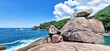 Beach Caxadaco with stones and transparent sea at island Ilha Grande, Rio de Janeiro, Brazil