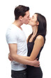 © Mr. Casting/peopleimages.com - Happy couple, kiss and hug with love in studio mockup, romance and care in committed relationship for bonding. Young man, woman and date for marriage loyalty, support and together by white background