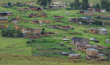 Rural Basotho Village With Rondavels In The Mountains, Lesotho, Africa