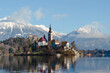 A church on an island on a lake in Bled, Slovenia. Winter.