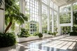 Space for large events in the atrium of the double height conservatory or greenhouse with large windows and natural sunlight