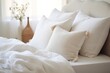 © LimeSky - Cozy bed with fluffy white pillows indoors