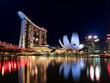 SINGAPORE - 2022 July : Night view at Marina Bay Sands Resort complex in Singapore. Luxury hotel and most expensive in world standalone casino property is main tourist attraction at 