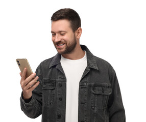 Wall Mural - Happy man sending message via smartphone on white background