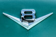 V8 emblem of an american oldtimer vintage muscle car.