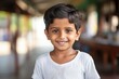 an india kid boy smile at camera