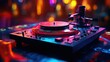 vinyl record player of a DJ on a blurry disco background
