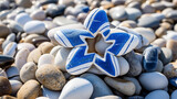 Fototapeta Desenie - david stern  shaped stones on the beach