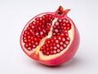 A pomegranate fruit is isolated on a white background.