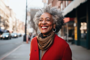 Canvas Print - Mature black woman smiling happy face on city street