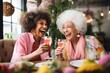 diverse senior women drinking cocktails at restaurant. Retired lady friends smiling, being happy and enjoying life. 