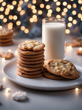 Christmas cookies and milk on the table. Christmas tree bokeh background.