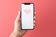 © dobok - woman hand hold white blank screen mobile on valentines day concept background