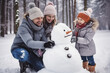 Happy parents and children gathering in snow park together sculpting funny snowman from snow. Father and two kids playing outdoor in winter forest