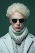 Stylish portrait of albino young man in studio, ai generated