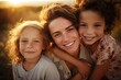 © linen - Portrait of a family smiling happily and warmly during sunset.