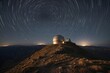 landscape of an isolated mountain dome observatory under star trails sky at night