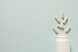 Fototapeta  - white plastic bottle and pills