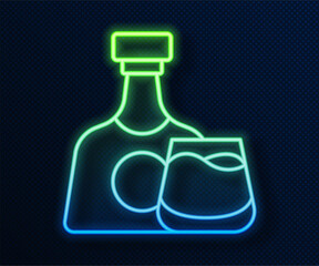 Sticker - Glowing neon line Whiskey bottle and glass icon isolated on blue background. Vector