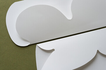 Wall Mural - folded paper with decorative cut paper edges on green