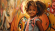 happy african american woman with curly hair on graffiti background