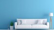 White sofa or couch with side tables on a solid blue background banner size fresh and calm interior