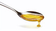 spoon with yellow golden honey or cooking oil isolated against white background