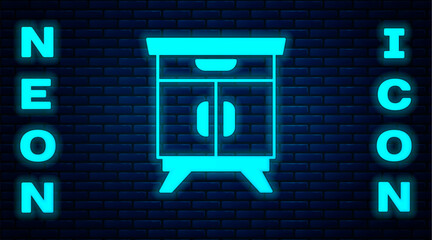 Sticker - Glowing neon Furniture nightstand icon isolated on brick wall background. Vector