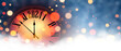 New Year 2024 countdown orange clock over blue background with defocused lights.
