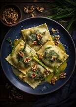 Asparagus Ravioli With Walnuts And Vegetables On A Plate