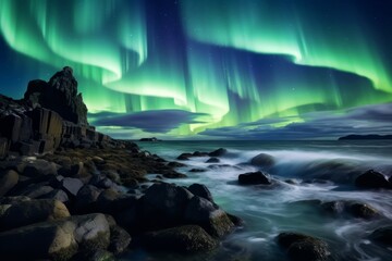 Wall Mural - overtaking northern lights shining green over the coast of iceland