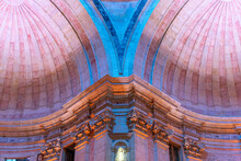 Lisbon National Pantheon. Image Of Dome And Vaulted Arched Ceiling With Colored Lighting, Church Of Santa Engracia.