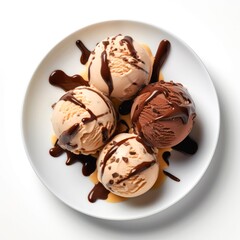 Canvas Print - Top view of plate with chocolate ice cream scoops on white background.