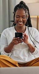 Canvas Print - Woman, cellphone and texting laughing for connection in home or communication, gossip or networking. Black person, mobile and online dating app for message text or social media, funny post or search