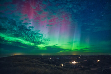 Wall Mural - Northern lights over the holiday homes in denmark. High quality photo