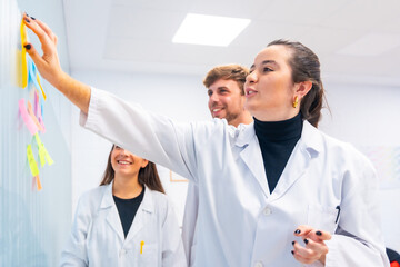 Wall Mural - brainstorming meeting in a cancer research laboratory