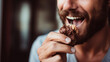 © Svetlana - Happy man biting cream cake in the cafe closeup