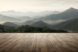 Fototapeta  - Wooden flooring in the afternoon fog with a mountain view.
