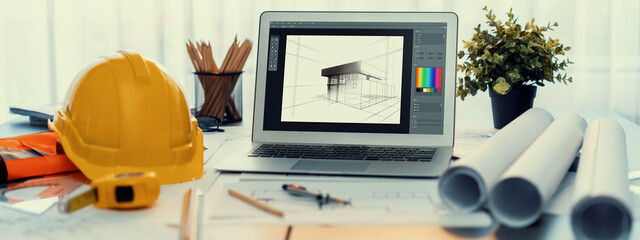 Digital blueprint by architecture design software on laptop screen with documents and blueprint layout on office table seamless integration of technology and traditional drafting method. Insight