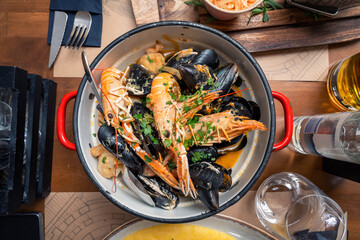 Top view of delicious croatian seafood platter served in a traditional seafood restaurant in Zadar, Croatia.