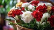 Bouquet of red and white carnation flowers in a basket. Mother's Day Concept. Valentine's Day Concept with a Copy Space. Springtime.