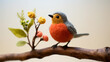 Handmade DIY figurine, cute crafted wool felt robin redbreast sits isolated on a blooming twig
