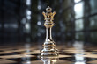 polished silver queen chess piece on a checkered board