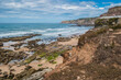 Porto Barril beach at low tide surrounded by cliffs, landscape of the West coast, Ericeira - Mafra PORTUGAL