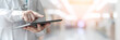 © Chinnapong - Medical doctor or physician in lab coat diagnose patient’s health online using mobile tablet in clinic, er room, or hospital office for professional digital emergency healthcare assistance service